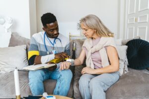 A nurse taking care of a senior's health